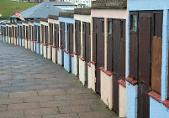 Photo of beach huts in Bude, Cornwall